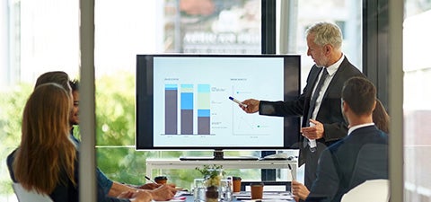 man doing presentation in meeting