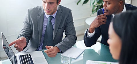 three people in meeting