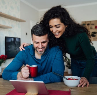 Couple looking at tablet