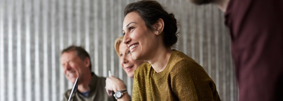 Woman smiling in meeting