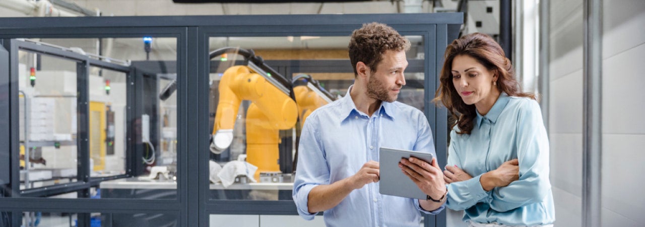 Man and woman at a factory