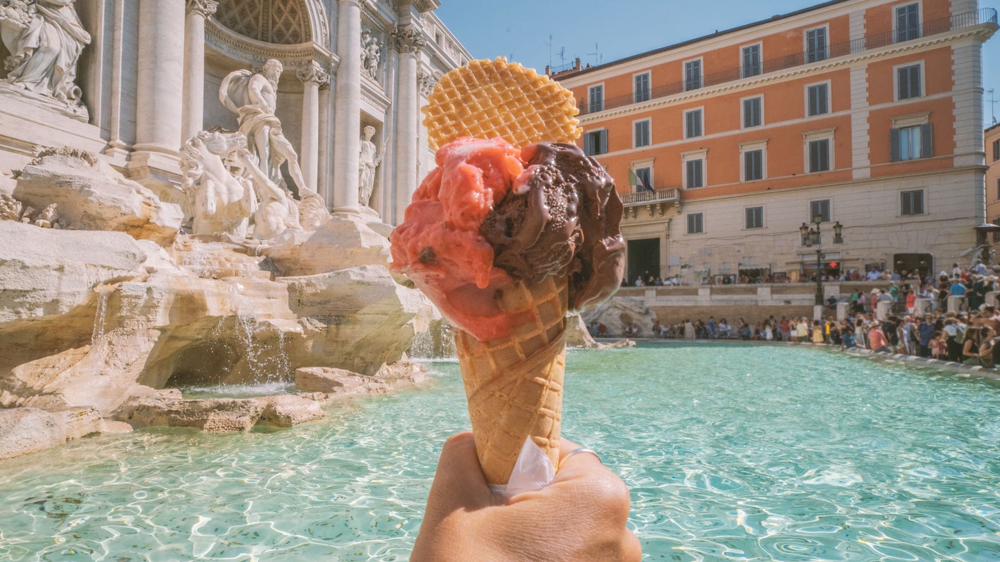 person holding ice cream cone