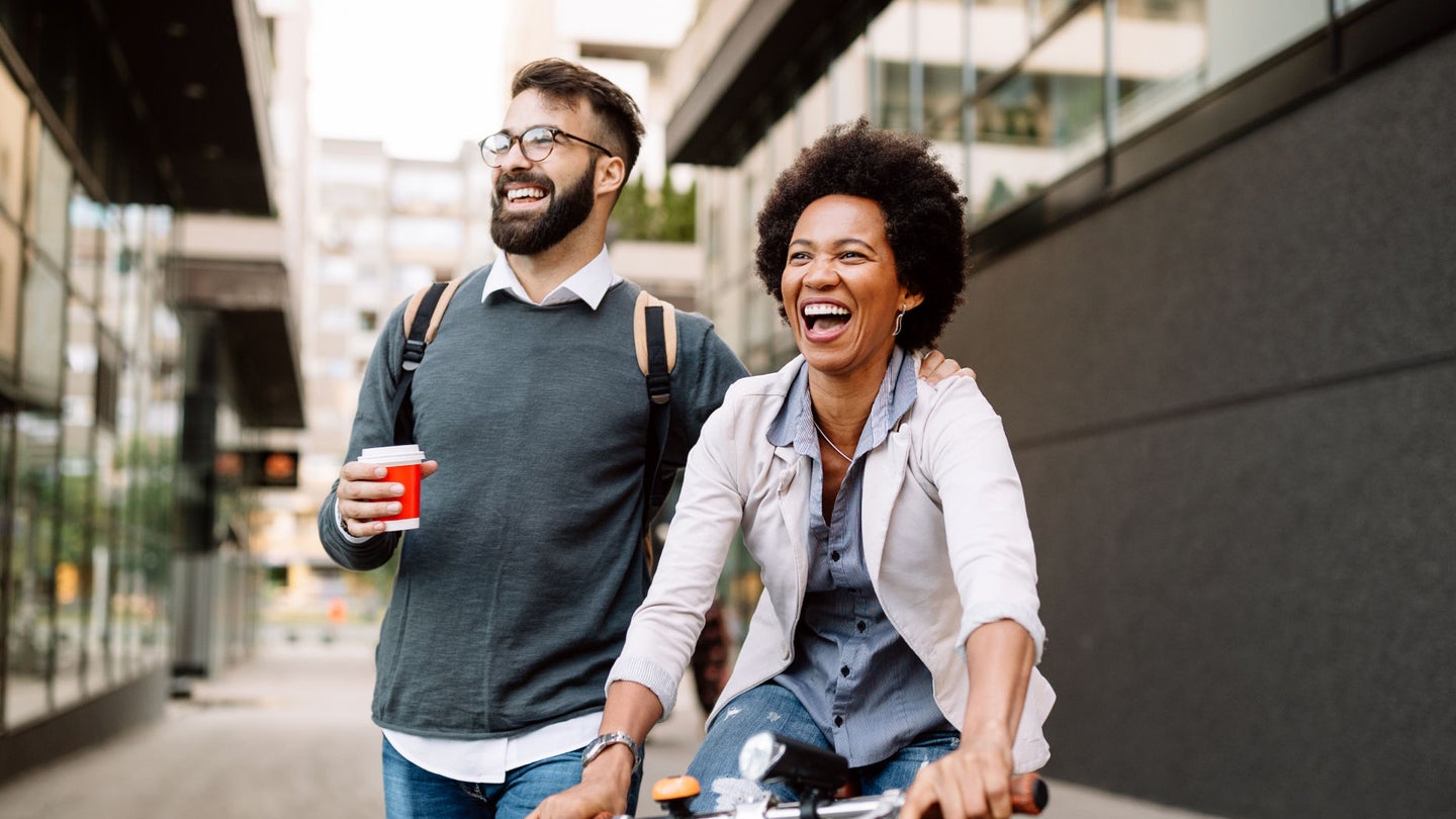 Two people smiling